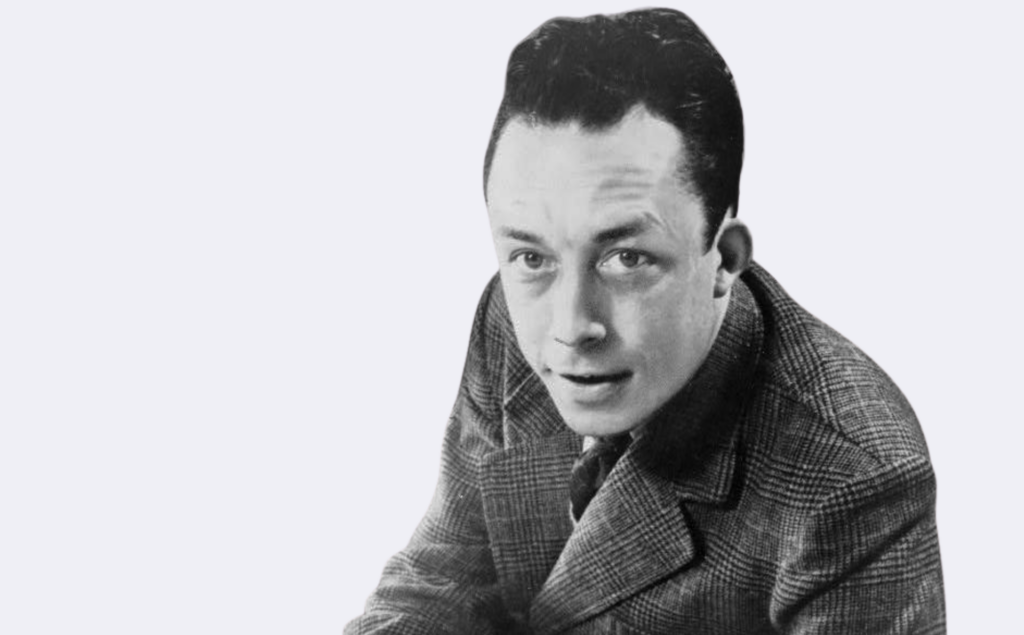 Fotografía de Albert Camus mirando a cámara.